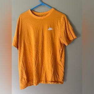 Orange Nike short sleeved tee, size large